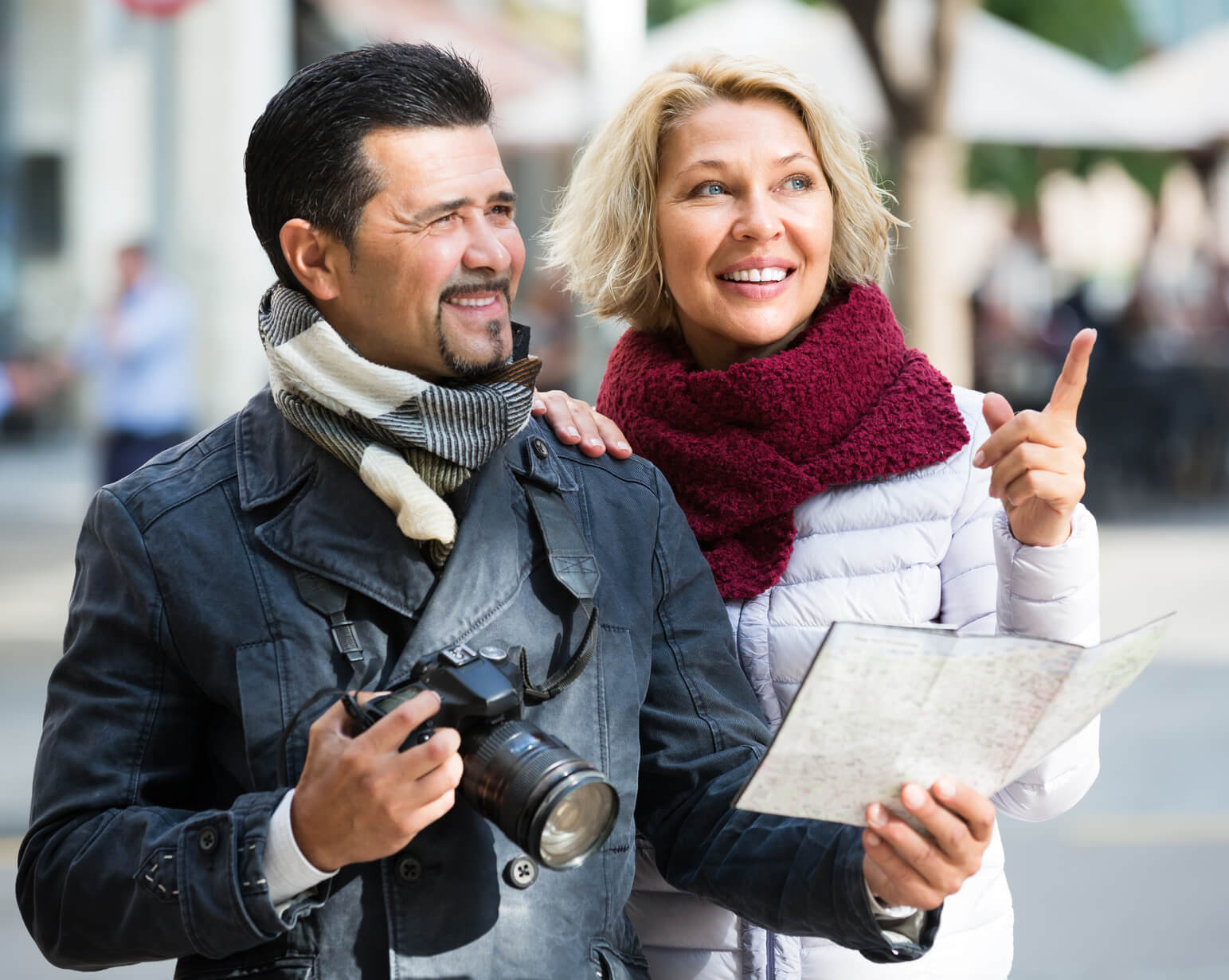 Mature tourists couple outdoor.